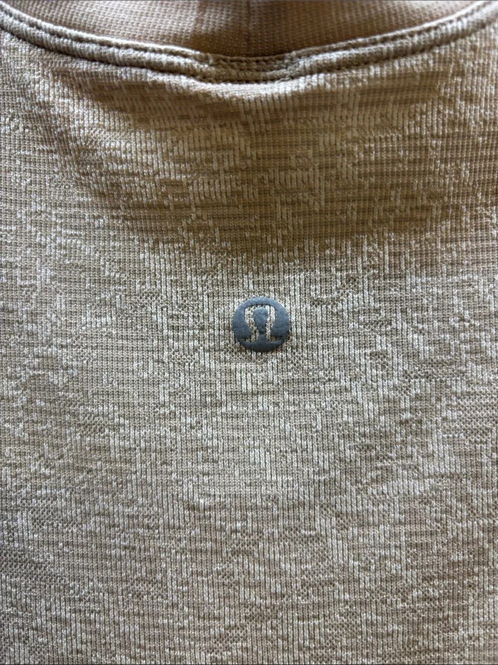 Lululemon Swiftly Breathe Muscle Tank in a metallic beige - size 4